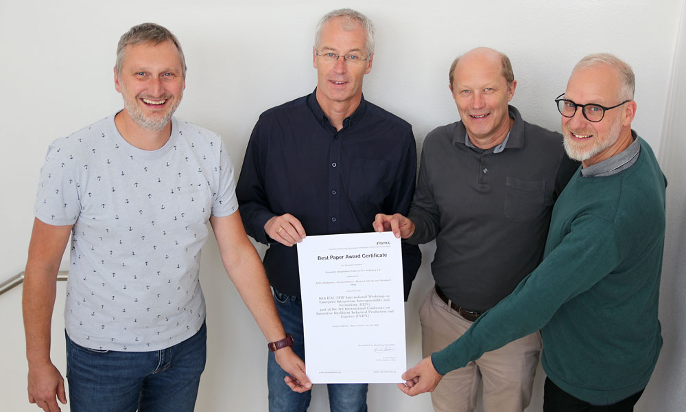 Die Autoren des ausgezeichneten Papers (v.l.n.r.:) Reinhard Mayr (COPA-DATA), Dietmar Glachs, Georg Güntner und Felix Strohmeier (Salzburg Research)